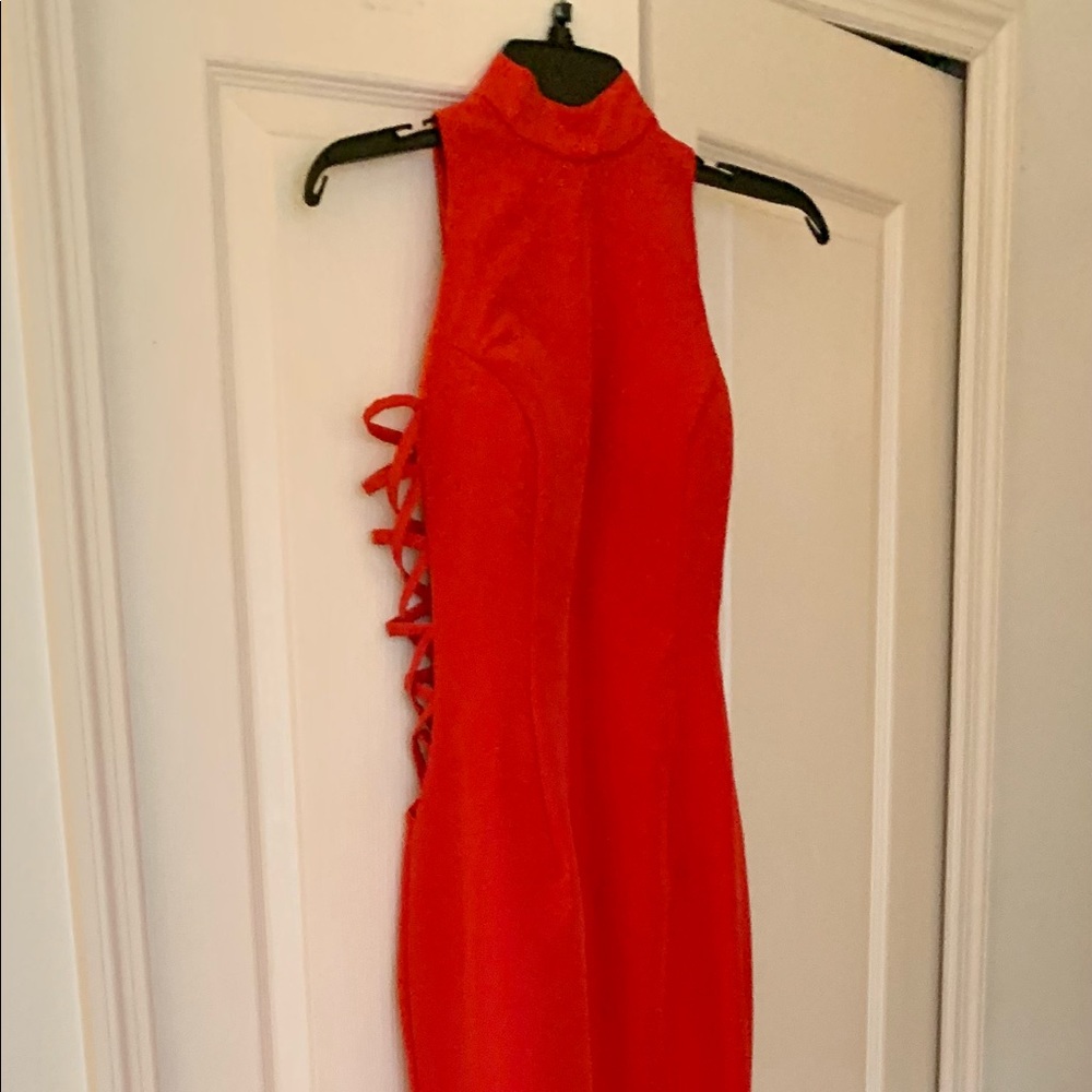 HEBOS Red dress long with train open sides never worn.